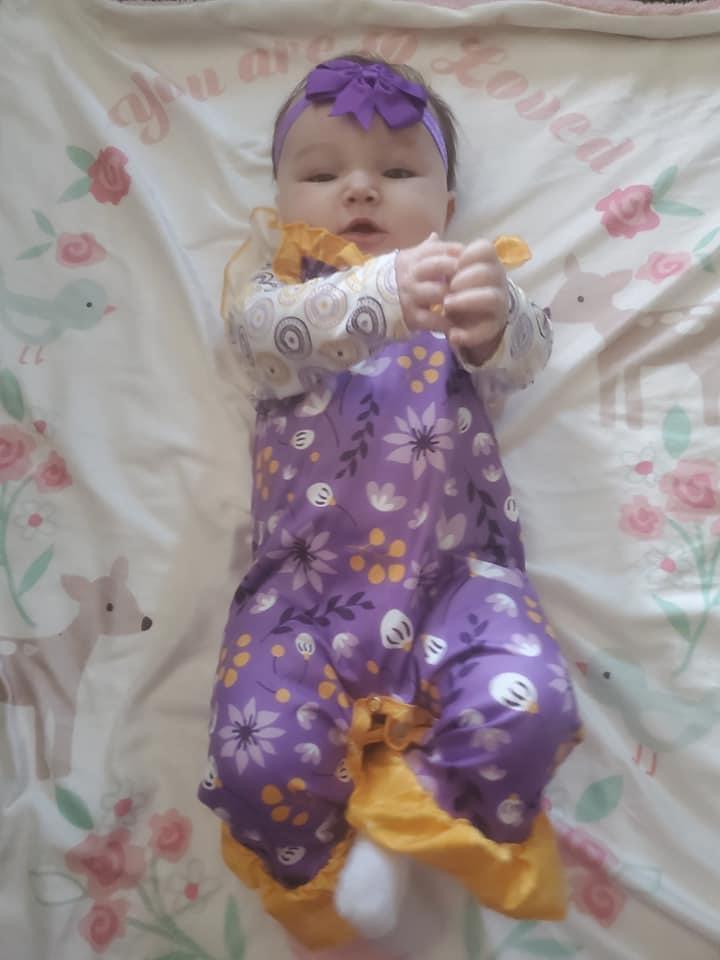 Floral romper in purple Baby in Styles